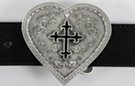 heart-shaped belt buckle with enameled black fleur-de-lis cross in center