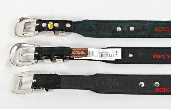 backs of Strait City Trading and Macy's golf concho belts