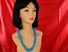 model with blue turquoise necklace