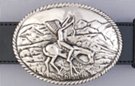 war bonnet rider and horse in moutains on bas-relief belt buckle